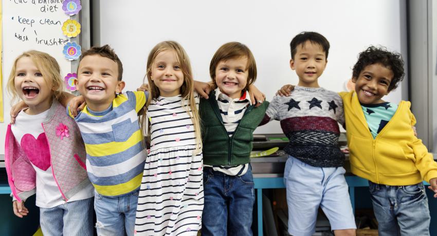 Group of young children in school